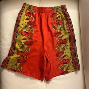 Urban Outfitters Size Small red floral high waisted long shorts. 100% Viscose
